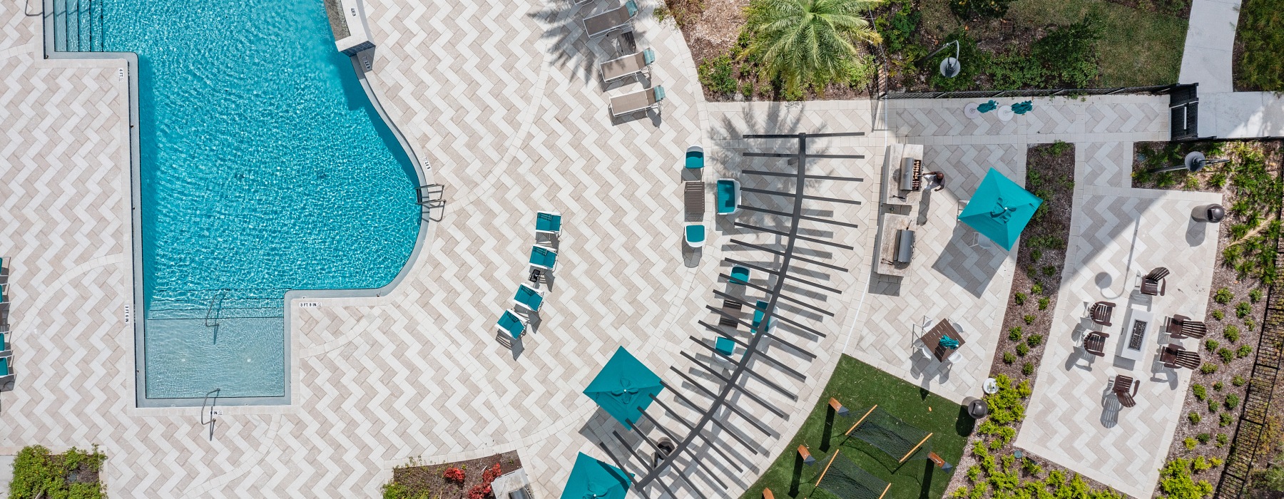 Arial view of poolside area and furniture
